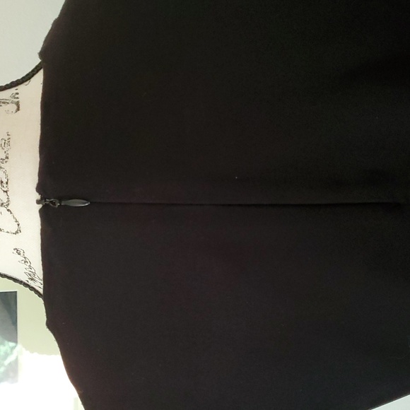 May May, black top with large, gathered sleeves. - Picture 5 of 7